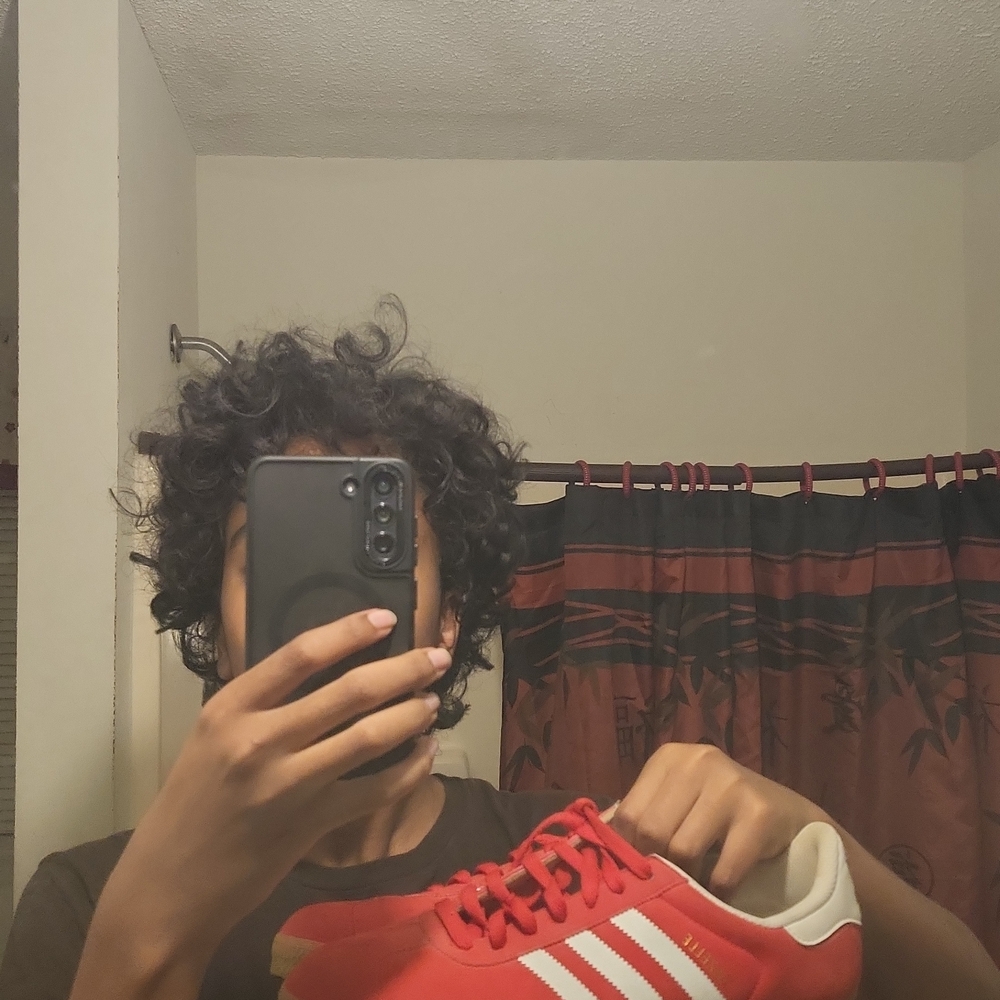 Adidas Red Sneakers with White Stripes